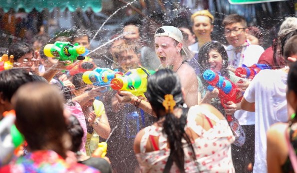 Where can I enjoy a water splash during the Songkran festival in Phuket?